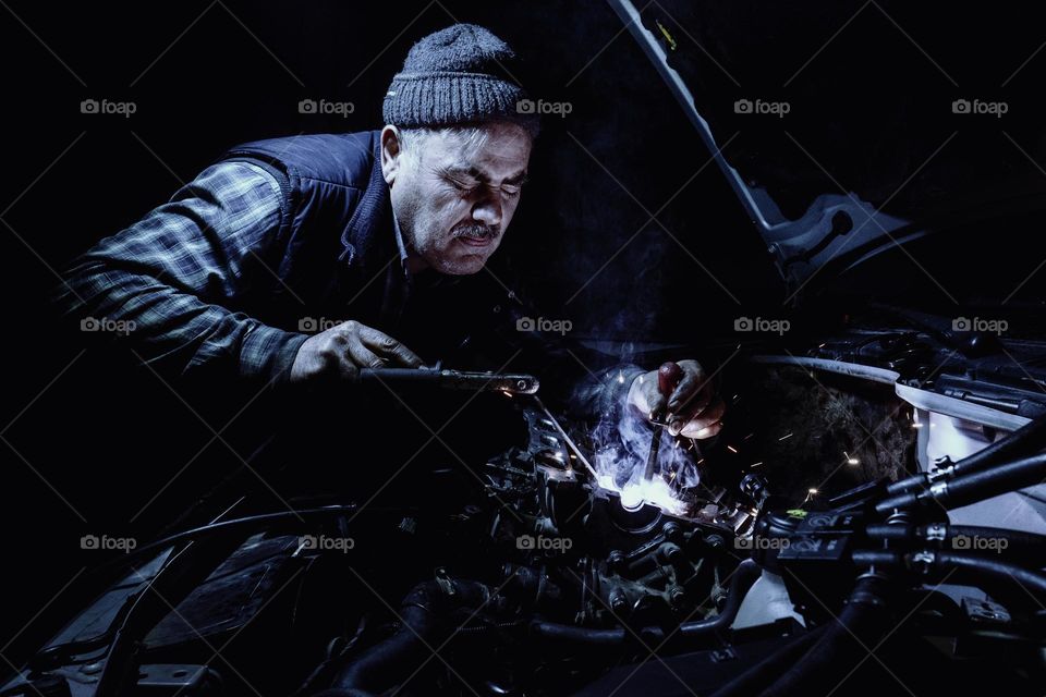 Mechanic repairing a car