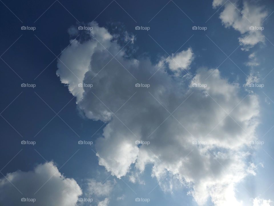 Cloud gazing? Take a break! Look up high! TWhat do you see? I see the shape of a body with a head,legs,torso, and arms. A character, a person, or perhaps a gingerbread man! This is the original to the prior two creative characters.