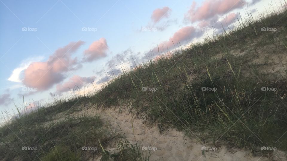 Pink clouds and a sandy path to paradise 