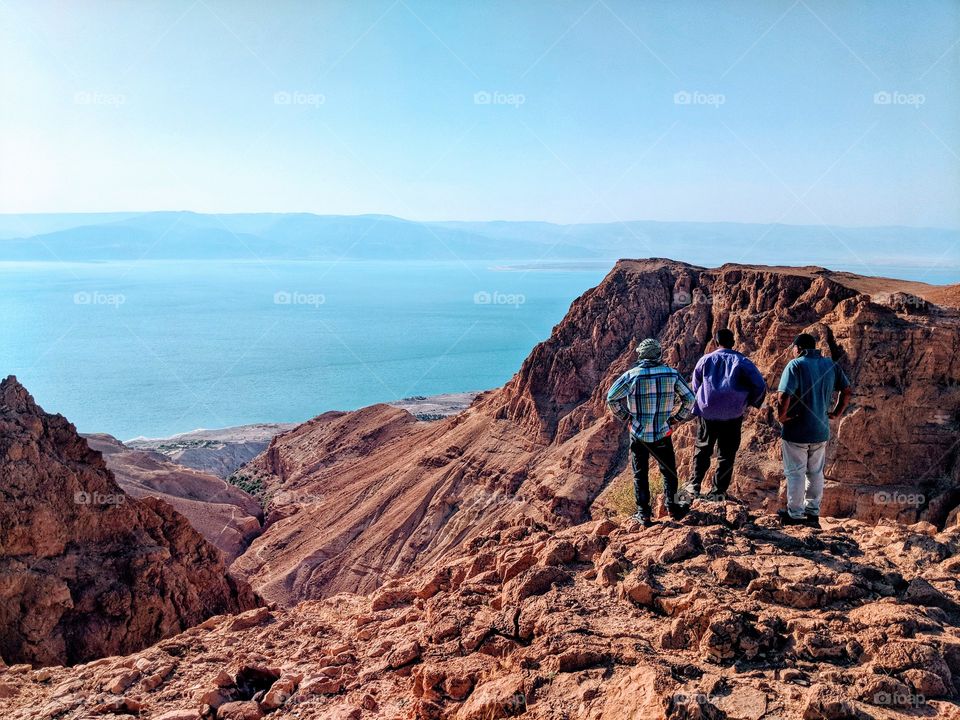 Group of people overlooking Ein Gedi and the Dead Sea