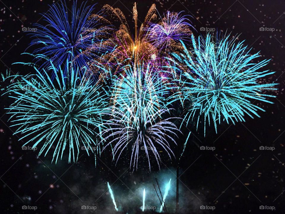 Vivid blue and violet fireworks.