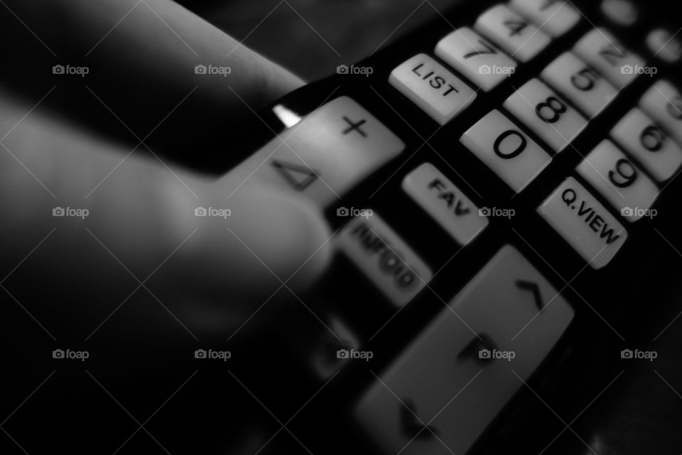 A Remote Control for the TV. Black and white image.