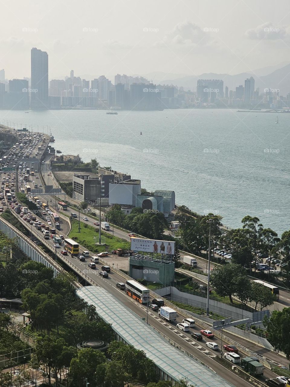 Friday late afternoon traffic next to Hong Kong Victoria Harbour