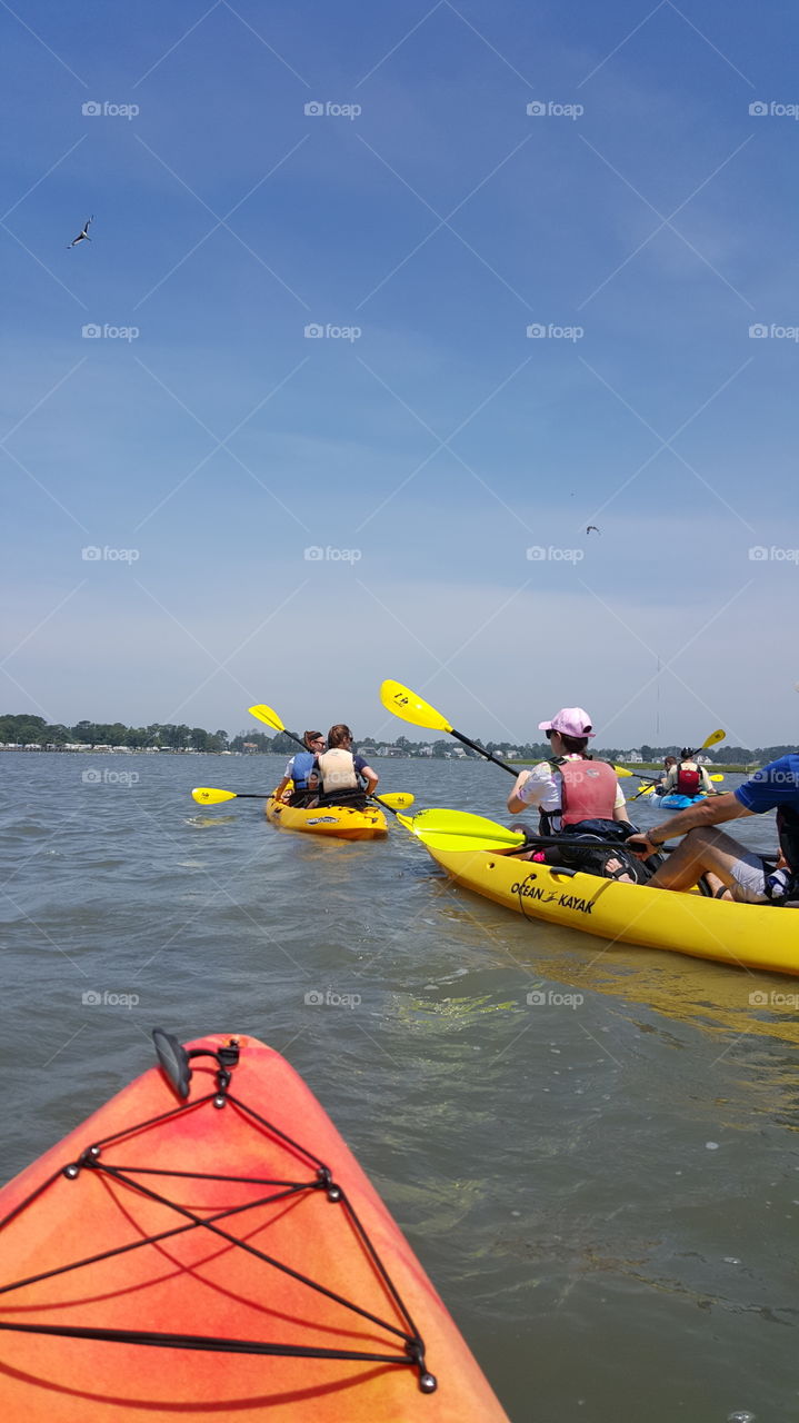 Kayaking across the ocean to an island is the best way to commute in the summer.