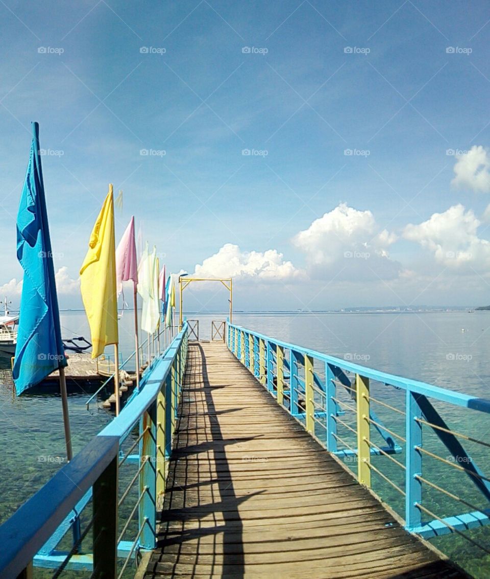 Way to driving board very nice place .Long bridge in a deep sea which is good to walk and take pictures.Nature that capture your heart a very nice sky.