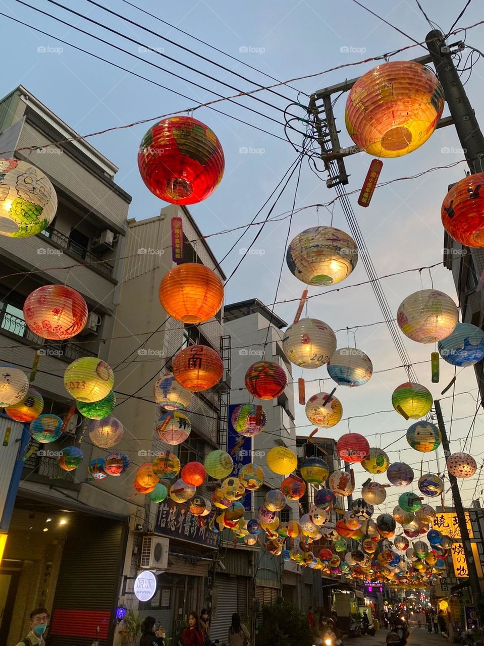 Creative Chinese lanterns decorated on street. Flow with wind. Colorful and beautiful.