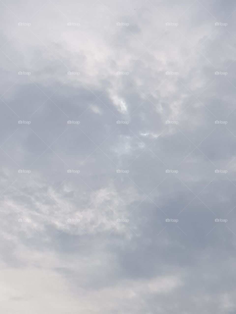 clouds and sun in the sky