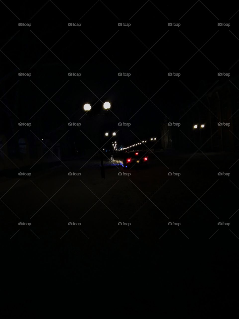 car and lights. evening.