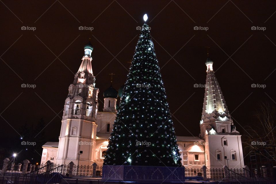 Christmas tree on the square next to the church