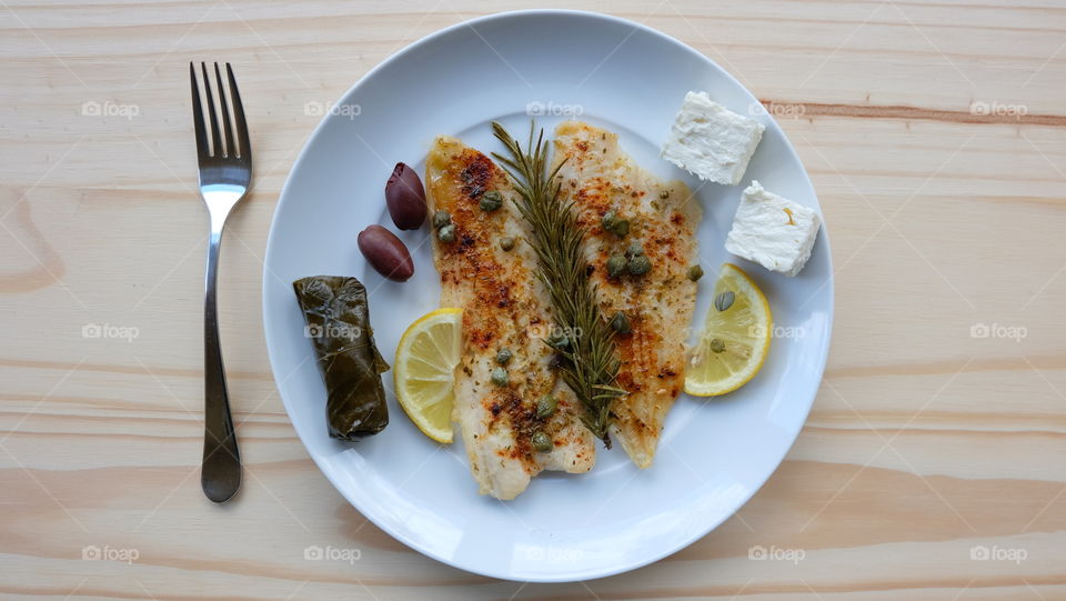 Delicious fish dish on plate