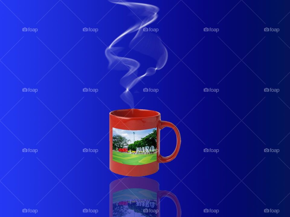 Hot water in glass cup, mug, blue degradation color background, white smoke bilowing, bandung city park image mug mockup, mug color is pink purple,