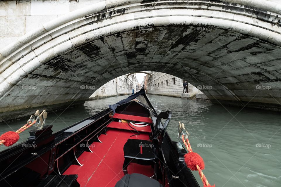 Gondola under a bridge