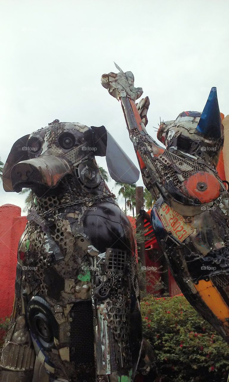 metal dog & cat sculpture