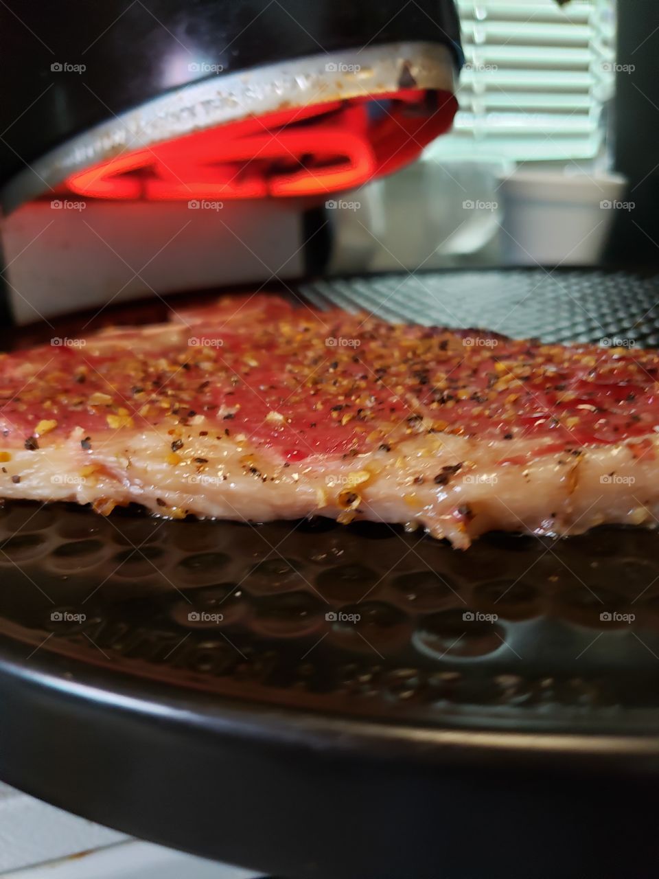steak on the pizza wheel