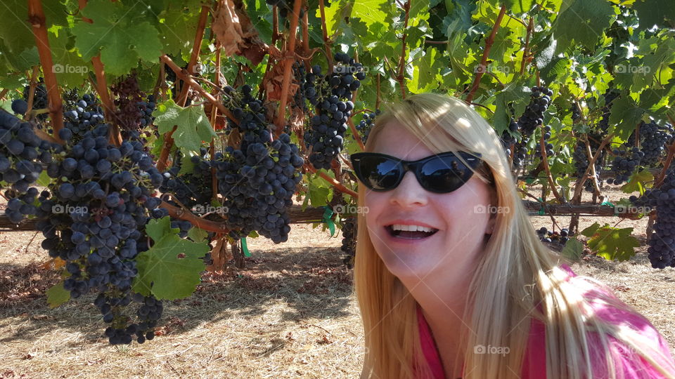 woman in grape vineyard