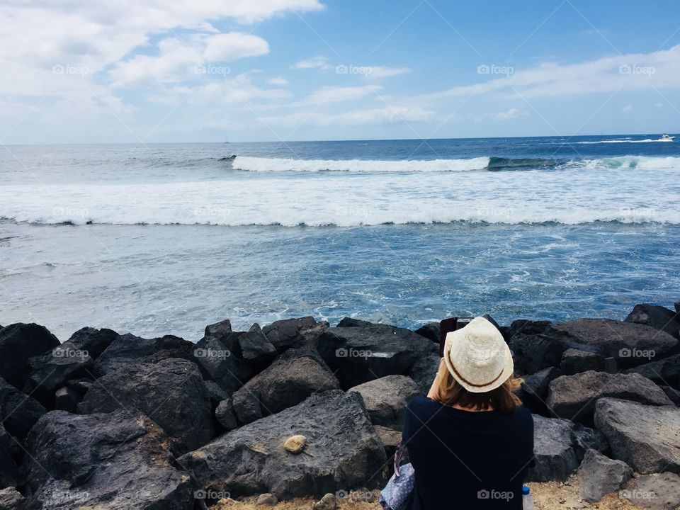 Woman looking out to sea