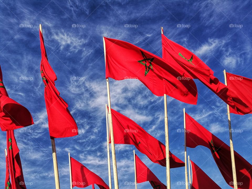 Flags of Morocco waving in the wind