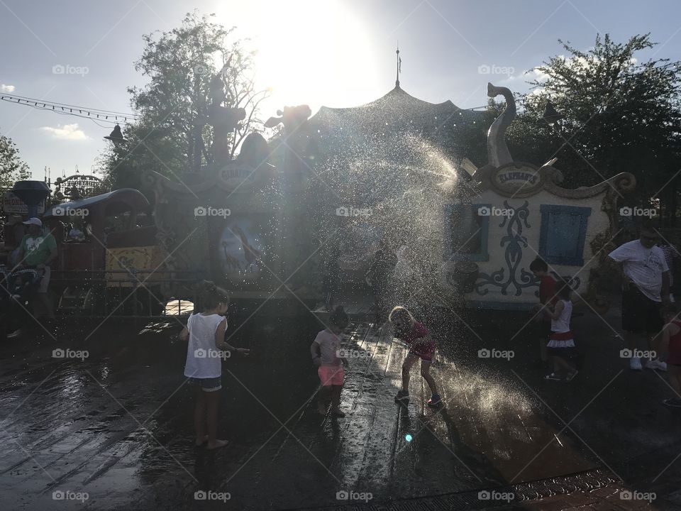 Kids playing in splash park 