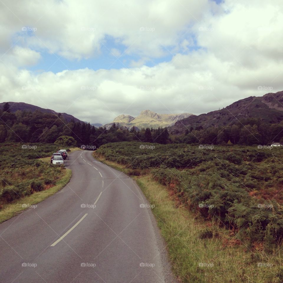 Bendy road through mountains . The Pennines in England 