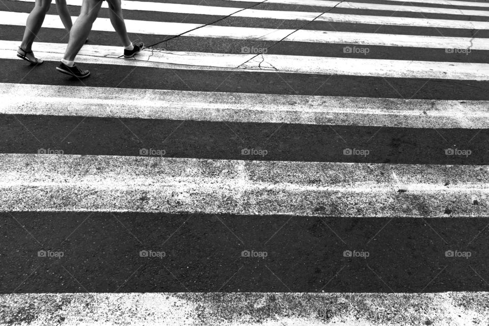 Pedestrian crossing in black and white