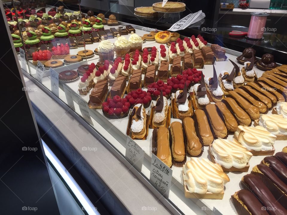Selecting pastry in France