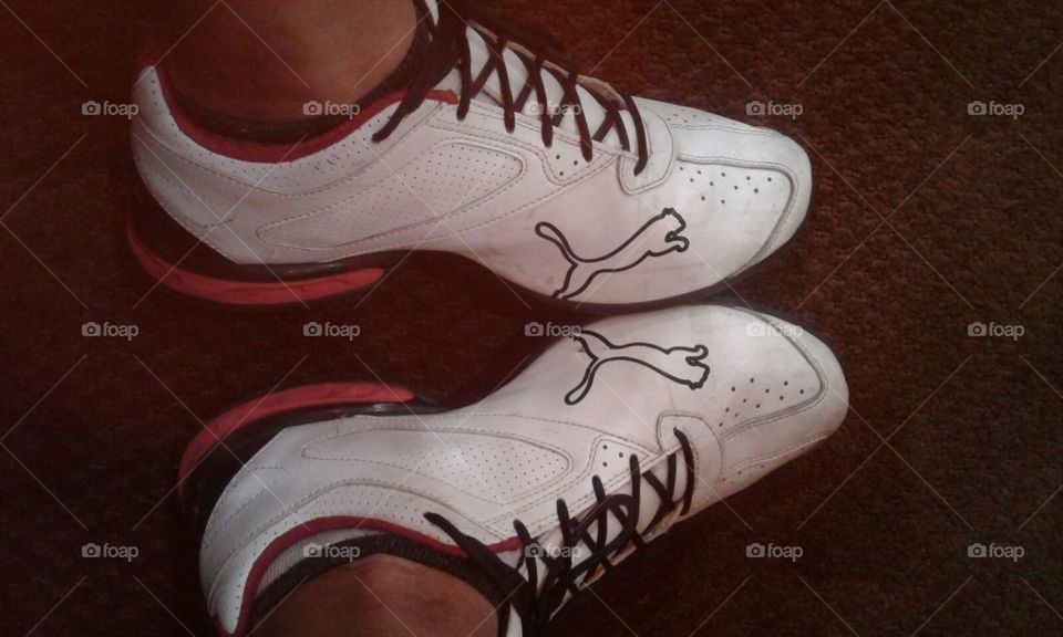 Sneakers showing brand