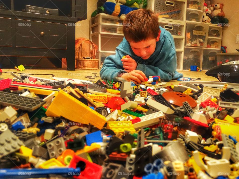 Boy building Legos