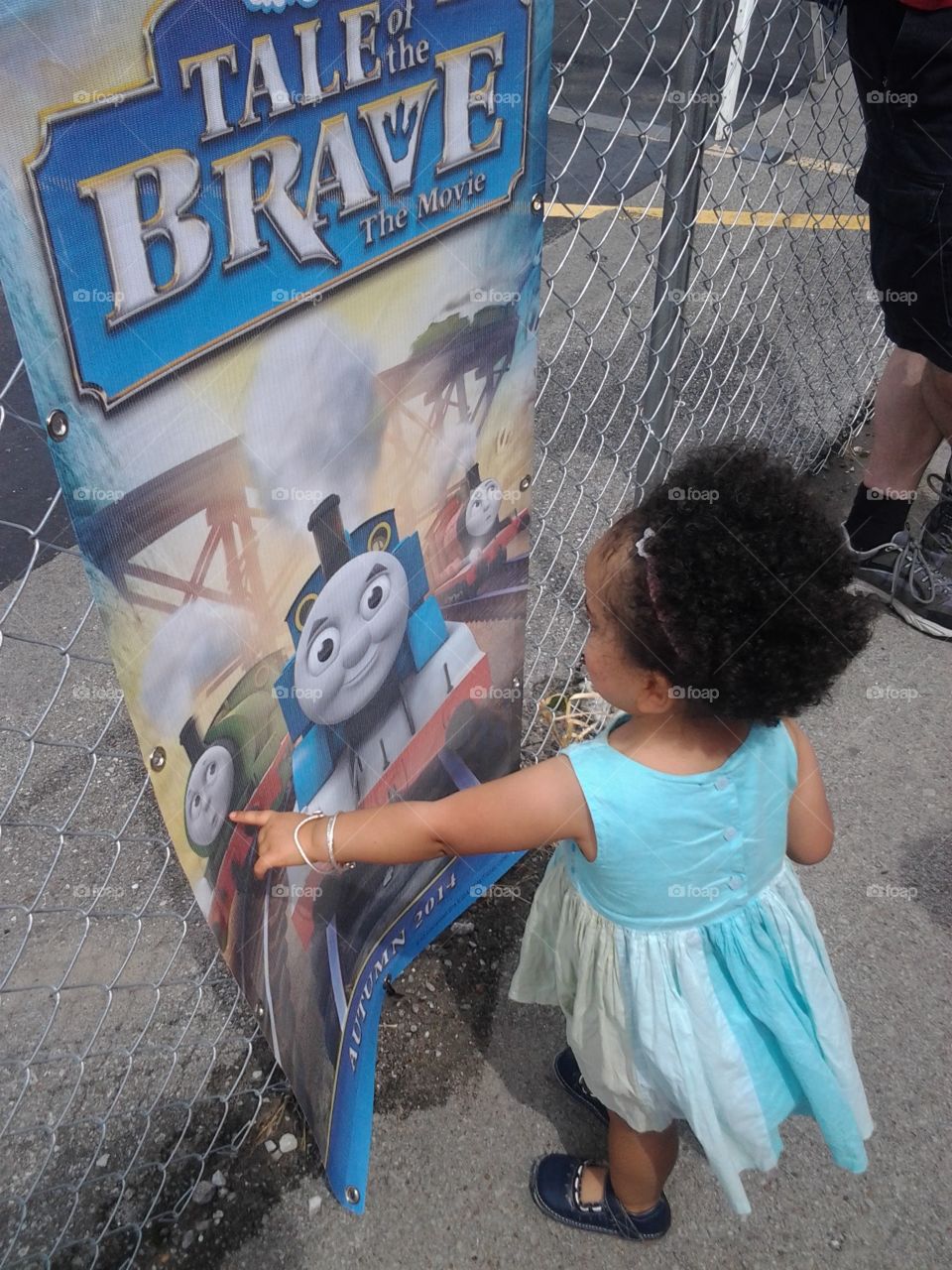 Her first Train Ride. Carmen prepping to board the Thomas train