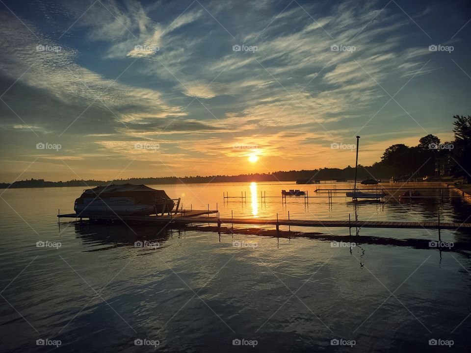 A beautiful sunrise to start a beautiful day. The sun reflecting off the water is so beautiful.