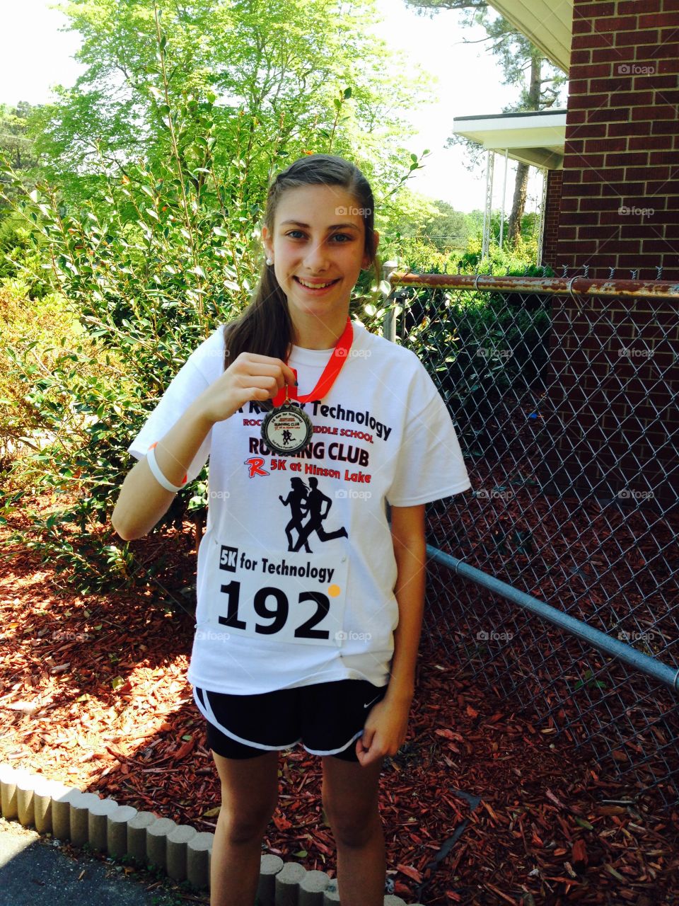 5k 2nd place runner up . Girl ran 5k she got a second place medal