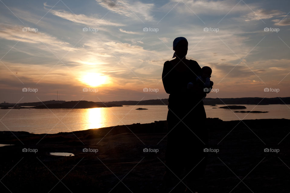 Sunset. Mother and daughter