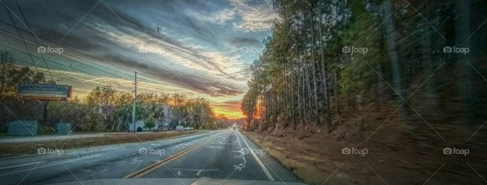 Road trip at sunset in the truck