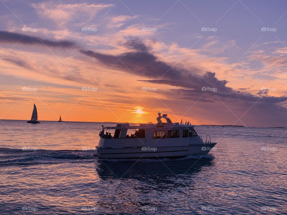 SUNSET AT MALLORY SQUARE