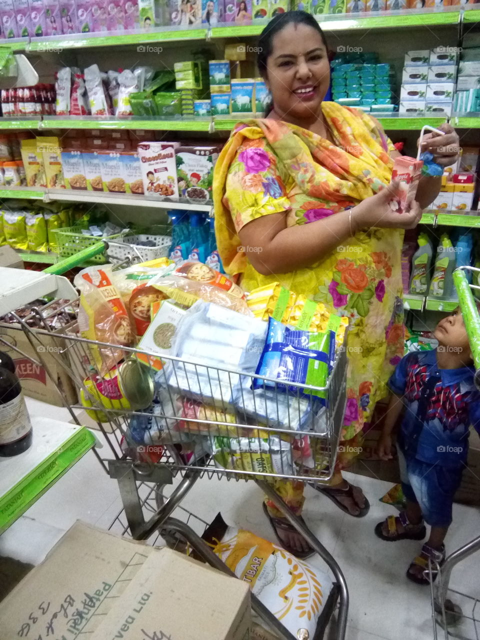 a beautiful woman shopping in a Patanjali products store.