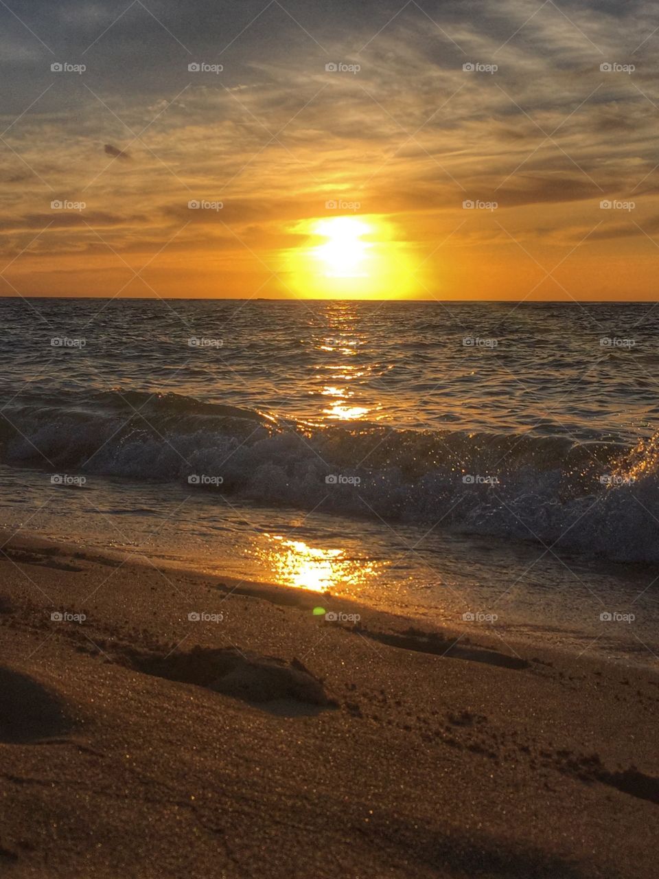 Sunset over the water