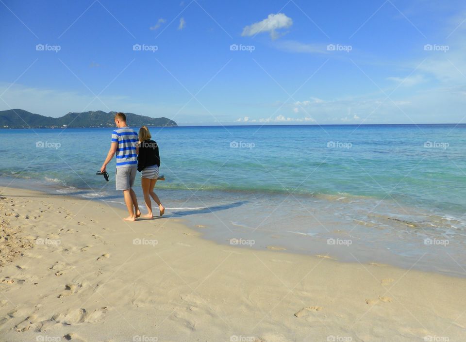 walking with your love on the beach