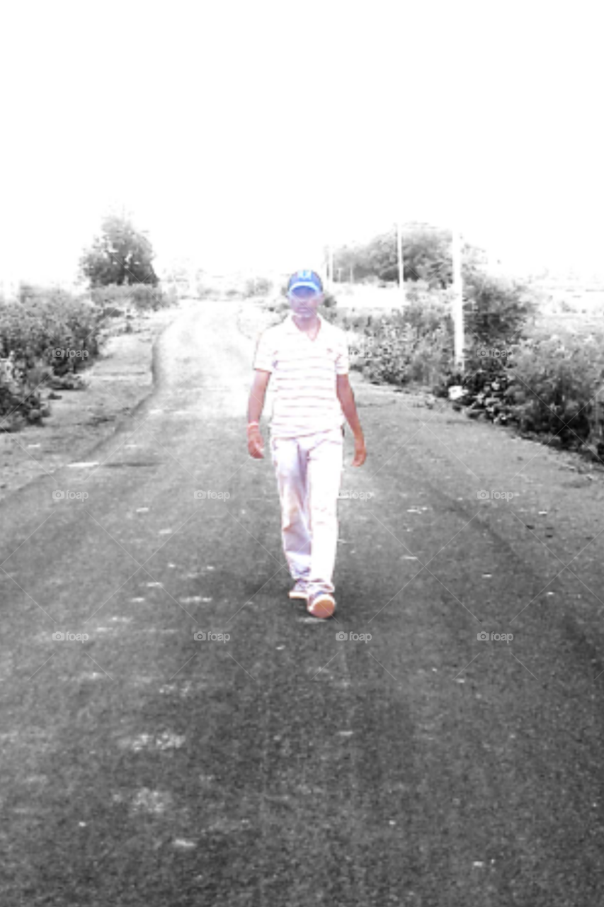 one boy photo/indian photo/one indian boy photo/model photo/one male model photo/good full photo/ruf and tuf photo/real style model photo/white t shirt photo/unique style photo of model/good photo of modeling /indian boy real style photo