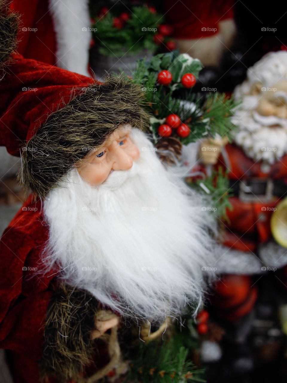 An old fashioned Santa Claus on display for the holiday season. 
