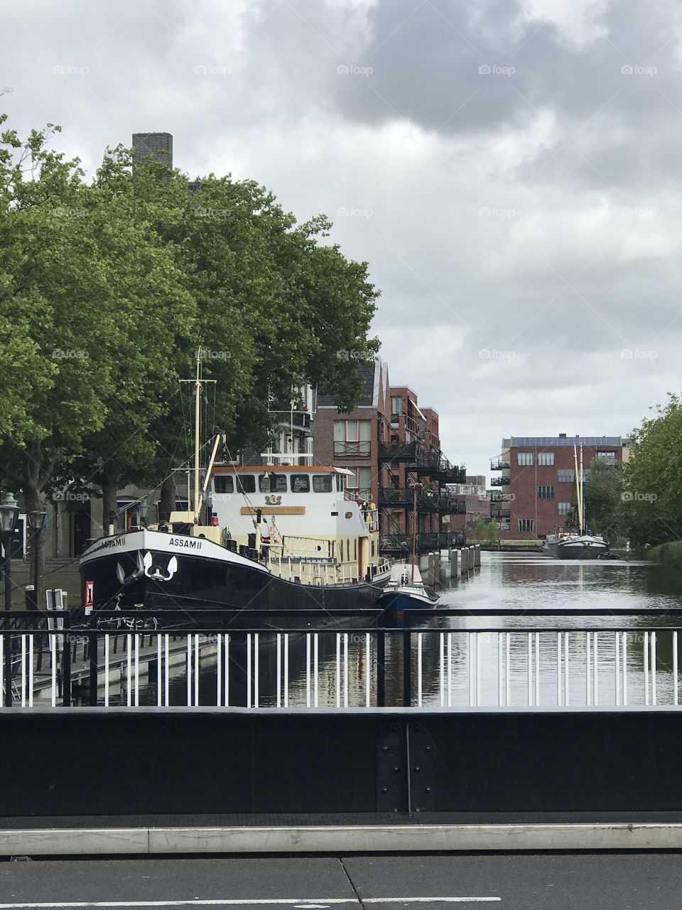 Tug boat
Water
Canal
Netherlands 
Rotterdam 
