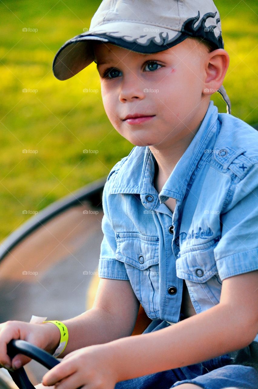 Cute boy . Boy going on the funfair