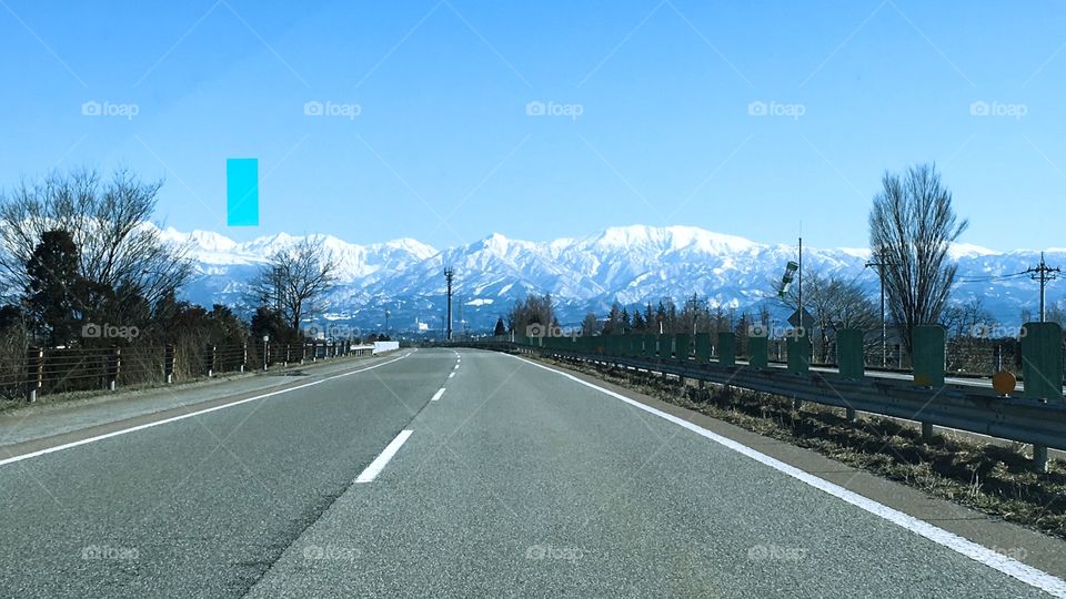 Road and mountain with show