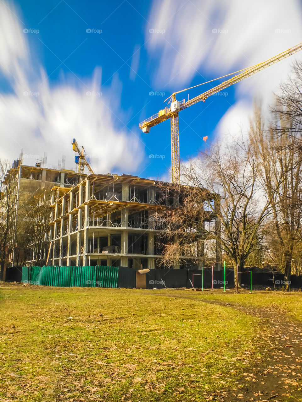 building process with crane on long exposure