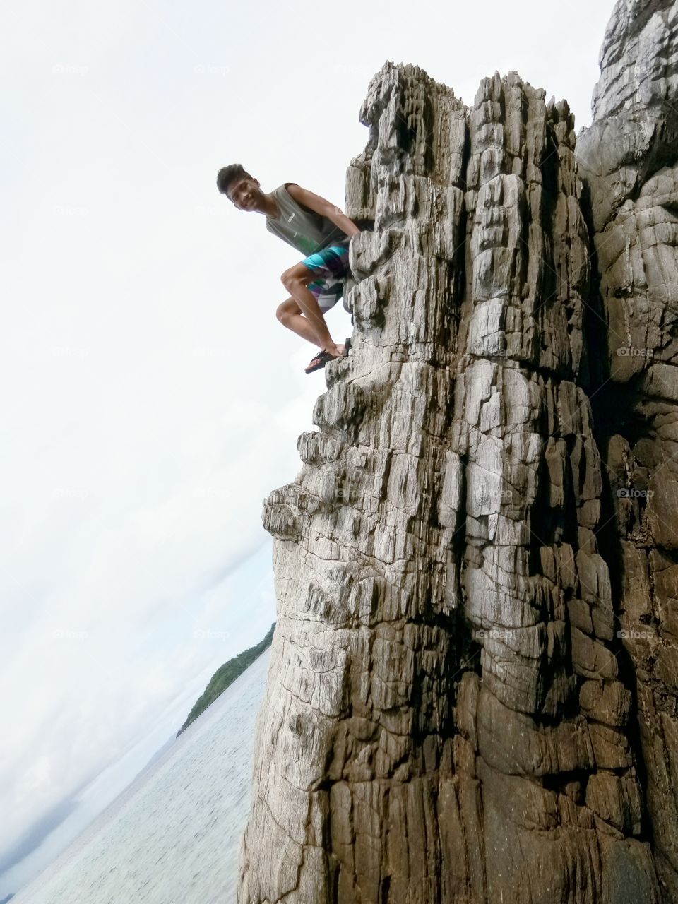 My brother is on the rock.  Never afraid to fall