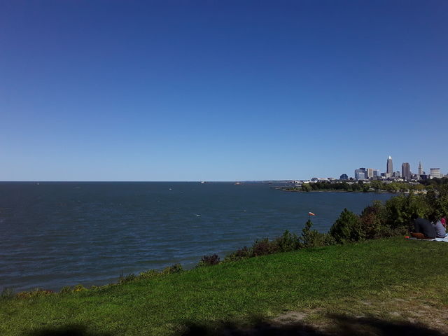sky and lake Erie with the green grass