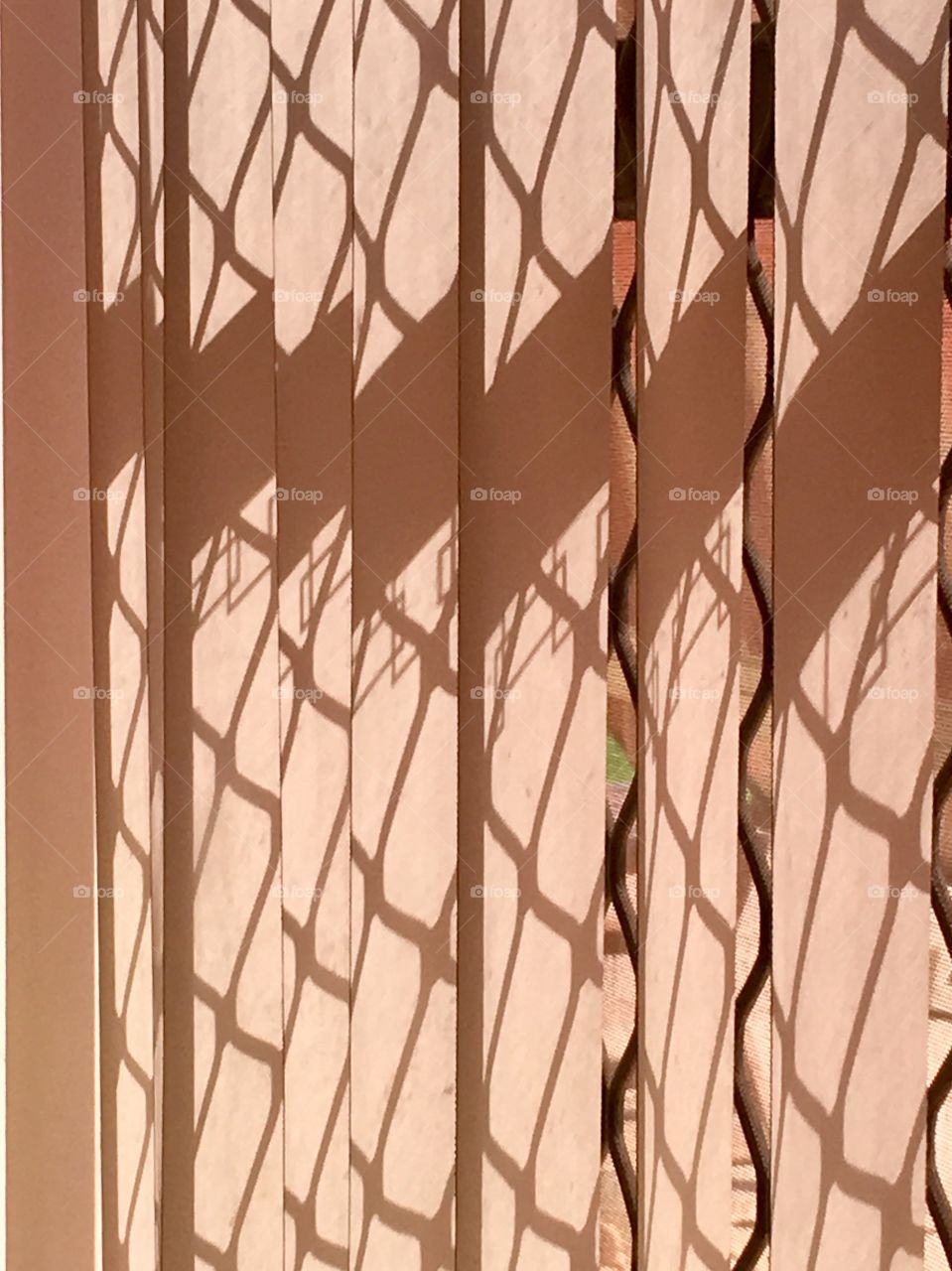 Shadow play on vertical blinds 