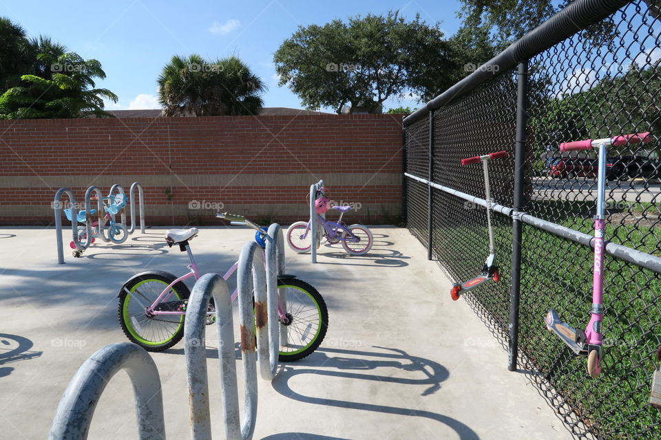 Bike Parking. Fenced in parking area for kids bicycles