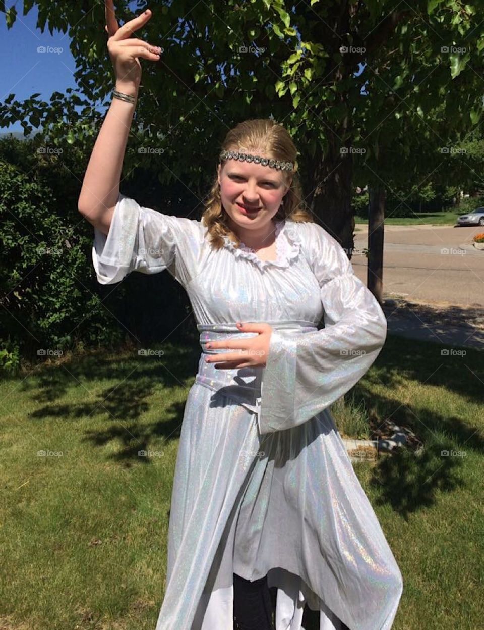Posing as usual, lil’ poser in her silver fountain costume for summer theatre.