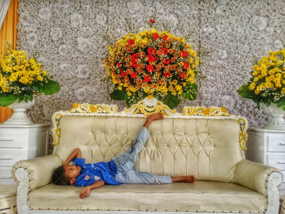 small child in a chair