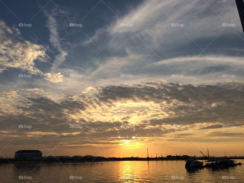 Dusk of sunset in the seashores of Makassar city, Indonesia. This place is best to visit. 