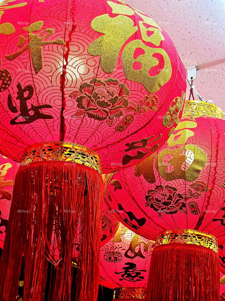 Hanging red lanterns high brings blessing and peace